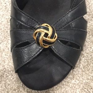 Black and gold knotted clip on earrings